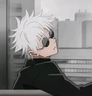 Gojo PFP #10: In grey tones, Gojo looks to the side in small round sunglasses and a black high collar outside a building.